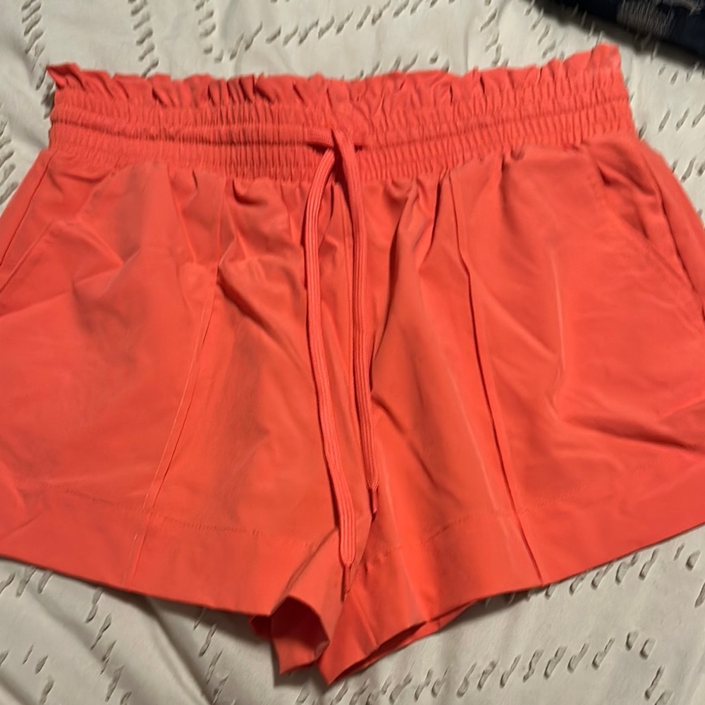 No Boundaries Women's Bright Coral Athletic Shorts